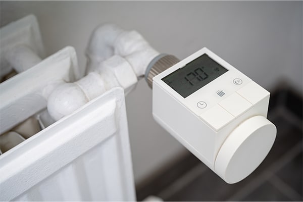 chauffer facture énergie chauffage vanne thermostatique programmer